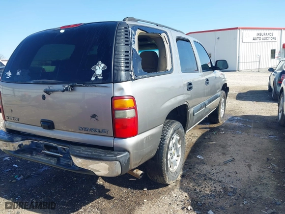 2003 Chevrolet Tahoe LS with VIN 1GNEC13V13J298445, listed as a IAAI auction lot 41728848 with 226,727 mi miles. Bid and sale history available at carsss.com. Image 4.