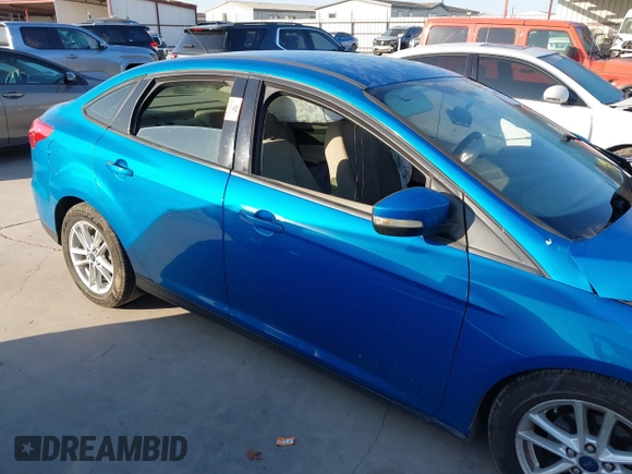 2016 Ford Focus SE with VIN 1FADP3F2XGL387131, listed as a IAAI auction lot 41992802 with 112,274 mi miles and . Bid and sale history available at DreamBid. Image 13.