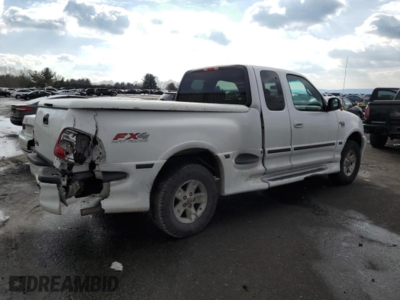 2002 Ford F-150 XL z VIN 2FTRX08L12CA26636, wystawiony jako Copart lot #89254825 z przebiegiem 133 637 mil mil oraz Szkoda całkowita • Salvage title. Historia ofert i sprzedaży dostępna na DreamBid. Obrazek 3.