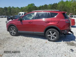 2018 Toyota RAV4 XLE with VIN JTMWFREV7JD119143, listed as a Copart auction lot 52576915 with 56,947 mi miles and Salvage Title. Bid and sale history available at carsss.com. Image 2.