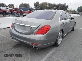 2015 Mercedes-Benz S-Class S 550 with VIN WDDUG8CB6FA185219, listed as a IAAI auction lot 42032135 with 104,346 mi miles. Bid and sale history available at carsss.com. Image 4.