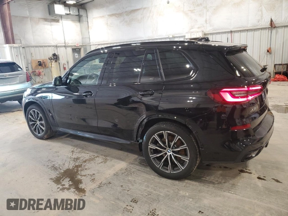 2021 BMW X5 xDrive45e with VIN 5UXTA6C02M9F45757, listed as a Copart auction lot 61991985 with 65,162 mi miles and Salvage title. Bid and sale history available at DreamBid. Image 2.