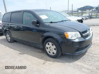 2012 Dodge Grand Caravan SE with VIN 2C4RDGBG2CR351999, listed as a IAAI auction lot 42075245 with 149,997 mi miles and . Bid and sale history available at DreamBid. Image 1.