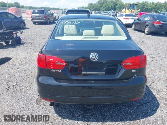 2014 Volkswagen Jetta SE with VIN 3VWD17AJ4EM429576, listed as a IAAI auction lot 42542604 with 142,313 mi miles and . Bid and sale history available at DreamBid. Image 16.