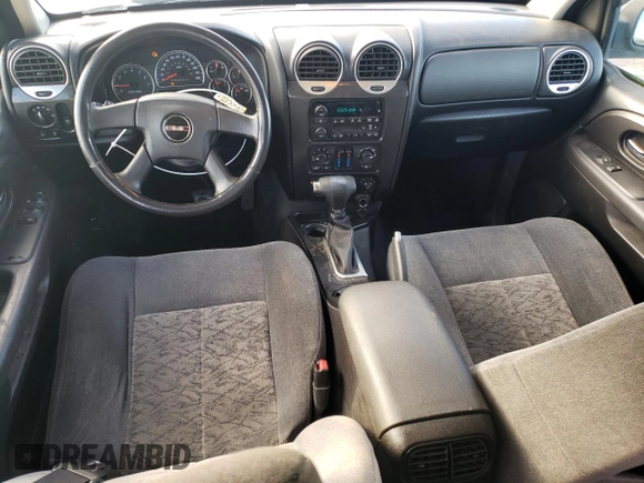 2006 GMC Envoy SLE with VIN 1GKDT13S262327772, listed as a Copart auction lot 85270134 with 242,390 mi miles and Salvage Title. Bid and sale history available at carsss.com. Image 8.