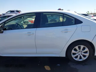 2022 Toyota Corolla LE with VIN JTDEPMAE7N3025132, listed as a IAAI auction lot 41867547 with 19,721 mi miles. Bid and sale history available at carsss.com. Image 14.