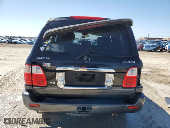 2004 Lexus LX 470 with VIN JTJHT00W043536558, listed as a Copart auction lot 48498305 with Not Provided miles and Salvage Title. Bid and sale history available at DreamBid. Image 6.