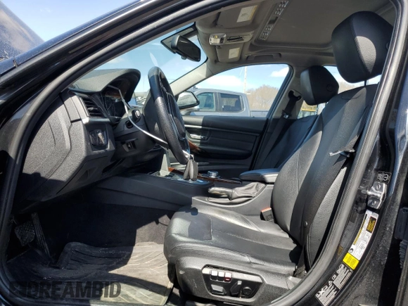 2014 BMW 3 Series 328i xDrive with VIN WBA3B3C58EJ977546, listed as a Copart auction lot 53090185 with 134,823 mi miles and Salvage Title. Bid and sale history available at DreamBid. Image 7.