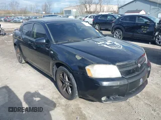2009 Dodge Avenger SXT with VIN 1B3LC56B09N573878, listed as a IAAI auction lot 42029743 with Not Provided miles. Bid and sale history available at carsss.com. Image 1.