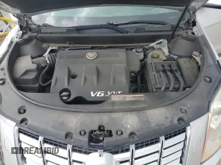 2013 Cadillac SRX Performance Collection z VIN 3GYFNHE3XDS622157, wystawiony jako Copart lot #53475675 z przebiegiem 95 253 mil mil oraz Szkoda całkowita • Salvage title. Historia ofert i sprzedaży dostępna na DreamBid. Obrazek 12.