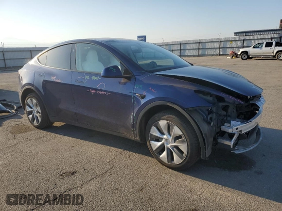 2023 Tesla Model Y Long Range with VIN 7SAYGDEE7PA146322, listed as a Copart auction lot 54071165 with 38,334 mi miles and Salvage Title. Bid and sale history available at DreamBid. Image 4.