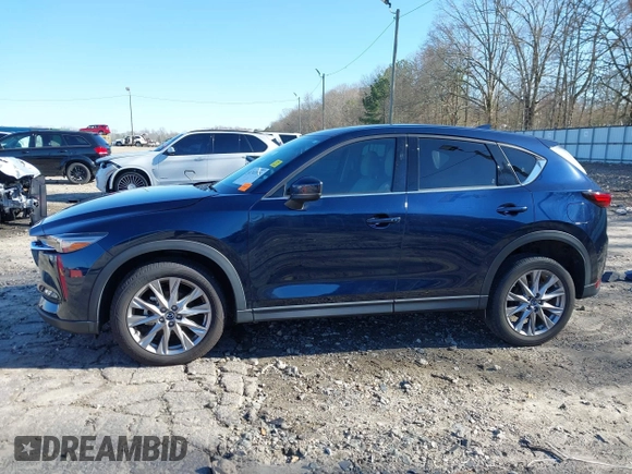 2021 Mazda CX-5 Grand Touring with VIN JM3KFADM5M0428279, listed as a IAAI auction lot 41747175 with 49,579 mi miles. Bid and sale history available at carsss.com. Image 15.