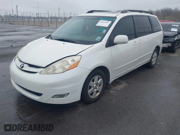 2010 Toyota Sienna XLE with VIN 5TDYK4CC1AS330349, listed as a IAAI auction lot 41607065 with 258,145 mi miles and . Bid and sale history available at carsss.com. Image 2.