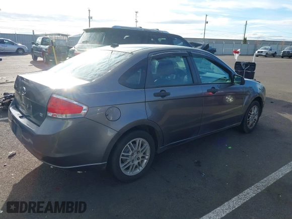 2010 Ford Focus SE with VIN 1FAHP3FN3AW243227, listed as a IAAI auction lot 41862142 with 264,713 mi miles. Bid and sale history available at carsss.com. Image 4.