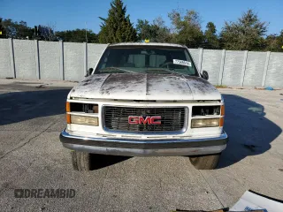 1999 GMC Suburban z VIN 3GKFK16RXXG503321, wystawiony jako Copart lot #77568614 z przebiegiem Nie podano mil oraz Tytuł czysty. Historia ofert i sprzedaży dostępna na DreamBid. Obrazek 5.