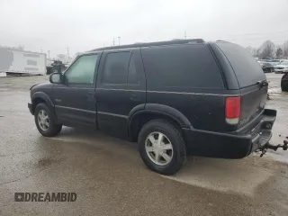 2000 Oldsmobile Bravada z VIN 1GHDT13W5Y2311819, wystawiony jako Copart lot #44839145 z przebiegiem 163 427 mil mil oraz Tytuł czysty. Historia ofert i sprzedaży dostępna na DreamBid. Obrazek 2.