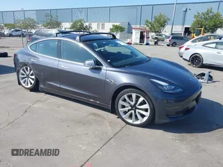 2018 Tesla Model 3 Long Range Battery with VIN 5YJ3E1EA4JF024102, listed as a IAAI auction lot 42100621 with 86,298 mi miles and . Bid and sale history available at DreamBid. Image 1.