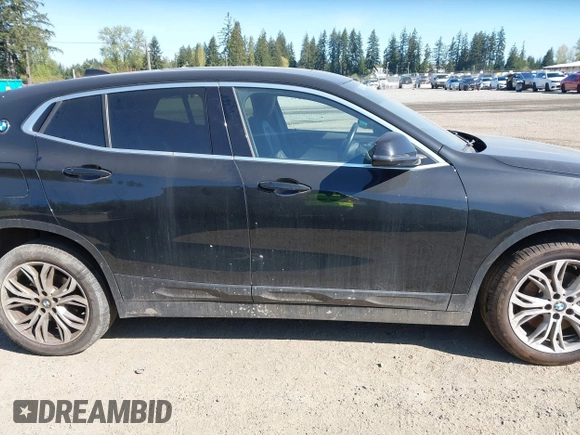 2018 BMW X2 xDrive28i with VIN WBXYJ5C30JEF69802, listed as a IAAI auction lot 42061382 with 55,138 mi miles. Bid and sale history available at carsss.com. Image 13.