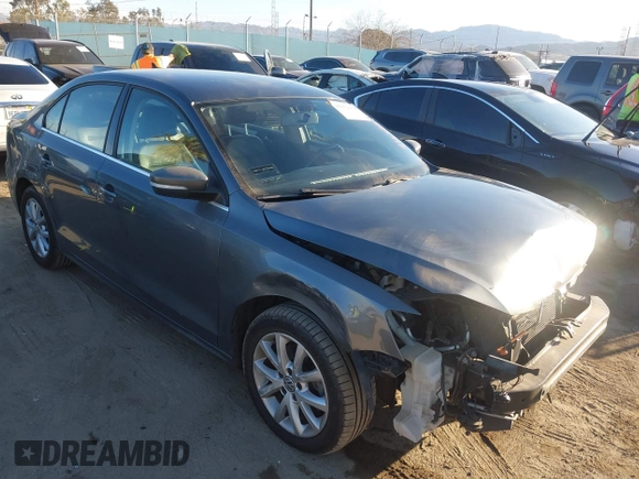 2014 Volkswagen Jetta SE z VIN 3VWD17AJ1EM285792, wystawiony jako IAAI lot #41652684 z przebiegiem 169 929 mil mil oraz . Historia ofert i sprzedaży dostępna na DreamBid. Obrazek 1.