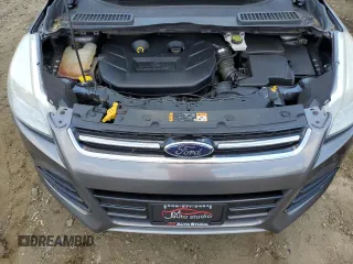 2014 Ford Escape Titanium with VIN 1FMCU9J91EUC90702, listed as a Copart auction lot 59116194 with 117,984 mi miles and Salvage Title. Bid and sale history available at DreamBid. Image 12.