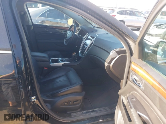 2015 Cadillac SRX Premium Collection with VIN 3GYFNGE3XFS554620, listed as a IAAI auction lot 42308670 with 95,063 mi miles and . Bid and sale history available at DreamBid. Image 5.