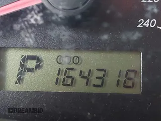 2009 Toyota Corolla with VIN 1NXBU40EX9Z027482, listed as a IAAI auction lot 42149978 with 164,318 mi miles. Bid and sale history available at carsss.com. Image 15.