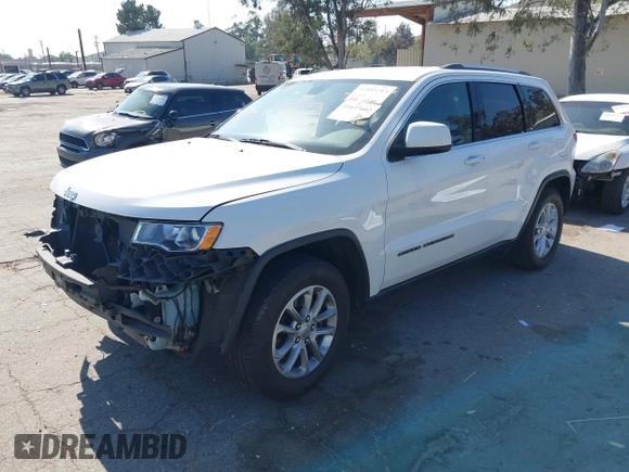 2021 Jeep Grand Cherokee Laredo X z VIN 1C4RJEAG3MC714500, wystawiony jako IAAI lot #41637602 z przebiegiem 71 537 mil mil oraz . Historia ofert i sprzedaży dostępna na DreamBid. Obrazek 2.