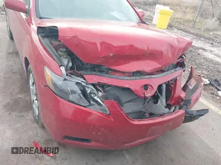 2007 Toyota Camry CE with VIN 4T1BE46K77U150924, listed as a IAAI auction lot 41798592 with 130,696 mi miles. Bid and sale history available at carsss.com. Image 6.