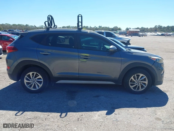 2017 Hyundai Tucson SE Plus with VIN KM8J33A45HU452928, listed as a IAAI auction lot 41601229 with 114,949 mi miles. Bid and sale history available at carsss.com. Image 13.