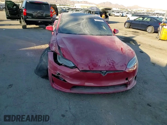 2021 Tesla Model S Plaid z VIN 5YJSA1E65MF435922, wystawiony jako Copart lot #77417854 z przebiegiem Nie podano mil oraz Szkoda całkowita • Salvage title. Historia ofert i sprzedaży dostępna na DreamBid. Obrazek 11.