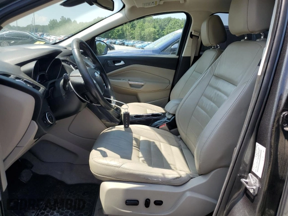 2015 Ford Escape Titanium with VIN 1FMCU9J95FUB74694, listed as a Copart auction lot 65044675 with 159,103 mi miles and Clean title. Bid and sale history available at DreamBid. Image 7.