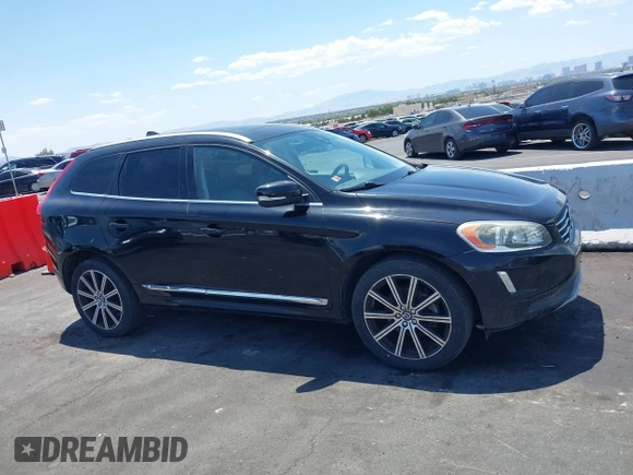2016 Volvo XC60 T6 Drive-E z VIN YV449MDK7G2811221, wystawiony jako IAAI lot #42476363 z przebiegiem 84 644 mil mil oraz . Historia ofert i sprzedaży dostępna na DreamBid. Obrazek 13.