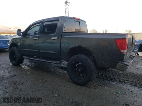 2004 Nissan Titan LE with VIN 1N6AA07A64N562975, listed as a Copart auction lot 85230234 with 99,973 mi miles and Salvage Title. Bid and sale history available at DreamBid. Image 2.
