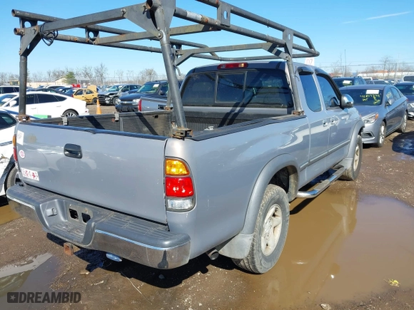 2000 Toyota Tundra SR5 with VIN 5TBBT4418YS043819, listed as a IAAI auction lot 41820617 with 249,454 mi miles. Bid and sale history available at carsss.com. Image 4.