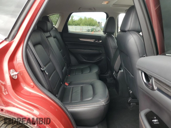 2019 Mazda CX-5 Grand Touring with VIN JM3KFBDM2K0639247, listed as a Copart auction lot 64060045 with 69,563 mi miles and Salvage title. Bid and sale history available at DreamBid. Image 11.