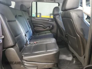 2015 Chevrolet Suburban LT z VIN 1GNSKJKC2FR744694, wystawiony jako Copart lot #56769735 z przebiegiem 125 944 mil mil oraz Szkoda całkowita • Salvage title. Historia ofert i sprzedaży dostępna na DreamBid. Obrazek 11.
