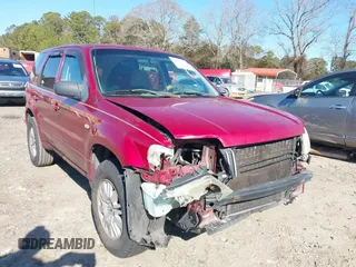 2006 Mercury Mariner Convenience with VIN 4M2YU56Z86KJ00414, listed as a IAAI auction lot 41251382 with 226,013 mi miles and . Bid and sale history available at DreamBid. Image 6.