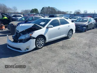 2012 Toyota Camry SE with VIN 4T1BK1FK1CU509931, listed as a IAAI auction lot 41474984 with 86,707 mi miles. Bid and sale history available at carsss.com. Image 2.