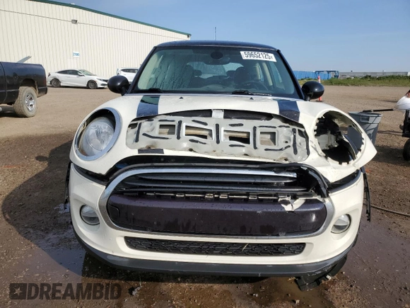 2016 MINI Hardtop with VIN WMWXP5C5XG2D15482, listed as a Copart auction lot 59652125 with 99,066 mi miles and Salvage title. Bid and sale history available at DreamBid. Image 5.