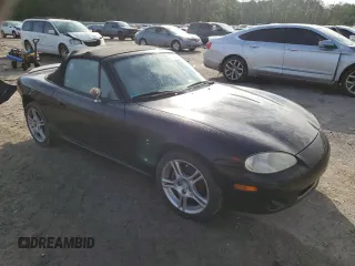 2004 Mazda MX-5 Miata LS with VIN JM1NB353140408906, listed as a Copart auction lot 56664715 with 86,603 mi miles and Salvage title. Bid and sale history available at DreamBid. Image 4.