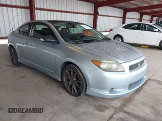 2007 Scion tC Spec with VIN JTKDE177270163067, listed as a IAAI auction lot 42058453 with 265,531 mi miles. Bid and sale history available at carsss.com. Image 1.