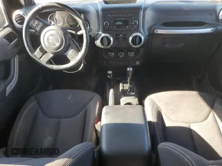 2014 Jeep Wrangler Sahara with VIN 1C4AJWBG2EL194843, listed as a Copart auction lot 79590514 with 80,574 mi miles and Non Repairable. Bid and sale history available at DreamBid. Image 8.