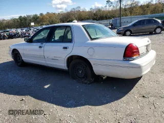 2000 Ford Crown Victoria LX z VIN 2FAFP74W0YX125595, wystawiony jako Copart lot #84675434 z przebiegiem 151 438 mil mil oraz Szkoda całkowita • Salvage title. Historia ofert i sprzedaży dostępna na DreamBid. Obrazek 2.