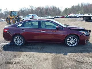 2014 Toyota Avalon Limited with VIN 4T1BK1EB1EU134577, listed as a IAAI auction lot 41994918 with 74,570 mi miles. Bid and sale history available at carsss.com. Image 13.