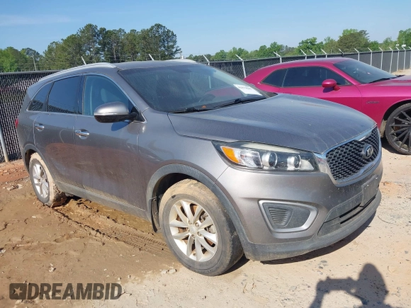 2017 Kia Sorento LX with VIN 5XYPG4A32HG294131, listed as a IAAI auction lot 42079685 with 106,166 mi miles. Bid and sale history available at carsss.com. Image 1.