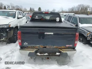 2011 GMC Canyon SLE1 with VIN 1GTH6MFE1B8124553, listed as a Copart auction lot 46122415 with 176,763 mi miles and Salvage title. Bid and sale history available at DreamBid. Image 6.