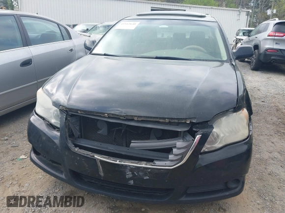 2010 Toyota Avalon XL with VIN 4T1BK3DB8AU358260, listed as a IAAI auction lot 41942640 with 230,584 mi miles and . Bid and sale history available at carsss.com. Image 12.