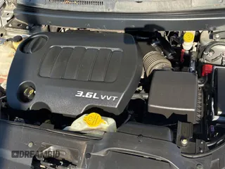 2013 Dodge Journey SXT with VIN 3C4PDDBG4DT593312, listed as a Copart auction lot 56431775 with 131,651 mi miles and Clean Title. Bid and sale history available at DreamBid. Image 7.