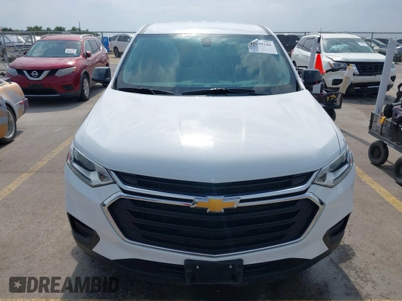 2020 Chevrolet Traverse LS z VIN 1GNERFKW4LJ314465, wystawiony jako IAAI lot #42030246 z przebiegiem 51 800 mil mil oraz . Historia ofert i sprzedaży dostępna na DreamBid. Obrazek 12.