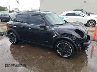 2012 MINI Countryman S with VIN WMWZC5C53CWM11801, listed as a Copart auction lot 43508965 with 101,751 mi miles and Salvage Title. Bid and sale history available at DreamBid. Image 4.